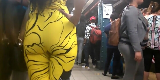 latina milf bubble booty in yellow jumpsuit