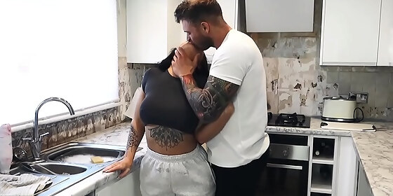 busty brunette gets anal in the kitchen