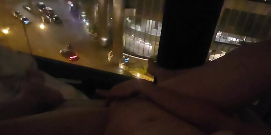 masturbating in public in front of hotel window