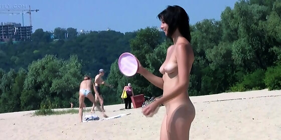 bombastic young nudist babes sunbathe nude at the beach