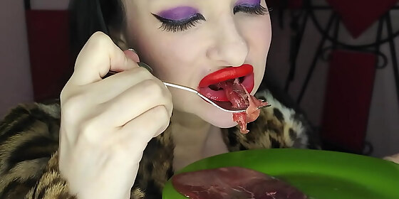 mukbang goddess in furs eats raw meat and eggs