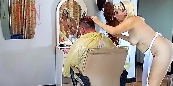 nudist barbershop nude lady hairdresser in an apron the client is surprised 2