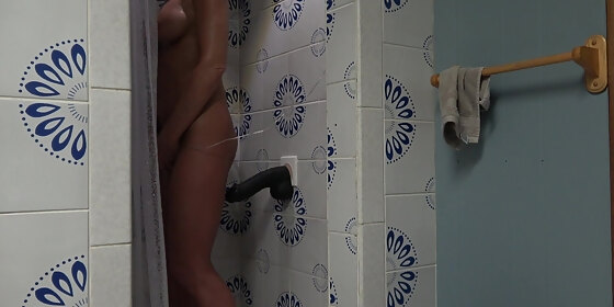 hot wife has hot shower riding thick black dildo to orgasm