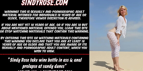sindy rose take wine bottle in ass anal prolapse at sandy dunes