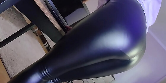 barefoot leader strict mistress in latex pants and high heels teases with wrinkled smelly soles