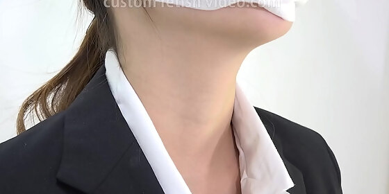 neck of a woman in a working suit