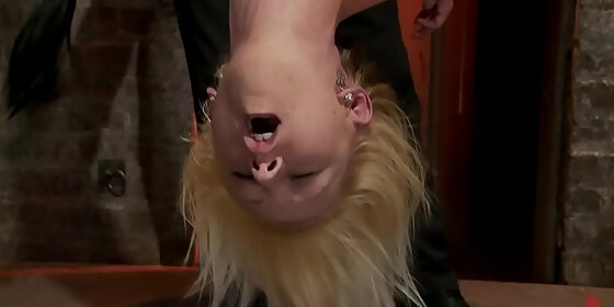 blond in upside down suspension whipped