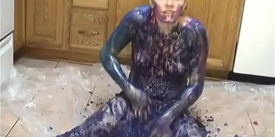 teen chick strips and plays in puddle of body paint on the kitchen floor