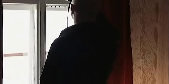 while getting a handjob a man watches his neighbors have sex