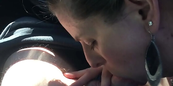 head slut sucking cock in parking lot