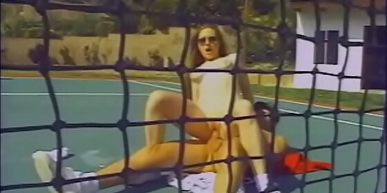 sexy brunette with nice tits enjoys fucking on the tennis court with a horny coach and sucks his cock